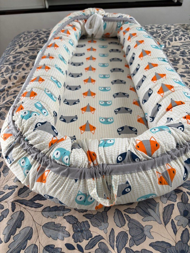 Baby Nest mobile bed (Category: Cots & Cribs) located in Singapore. Submitted by ajt883 (Listing ID 1373095373, Image 3). Description: Barely used, in great condition .