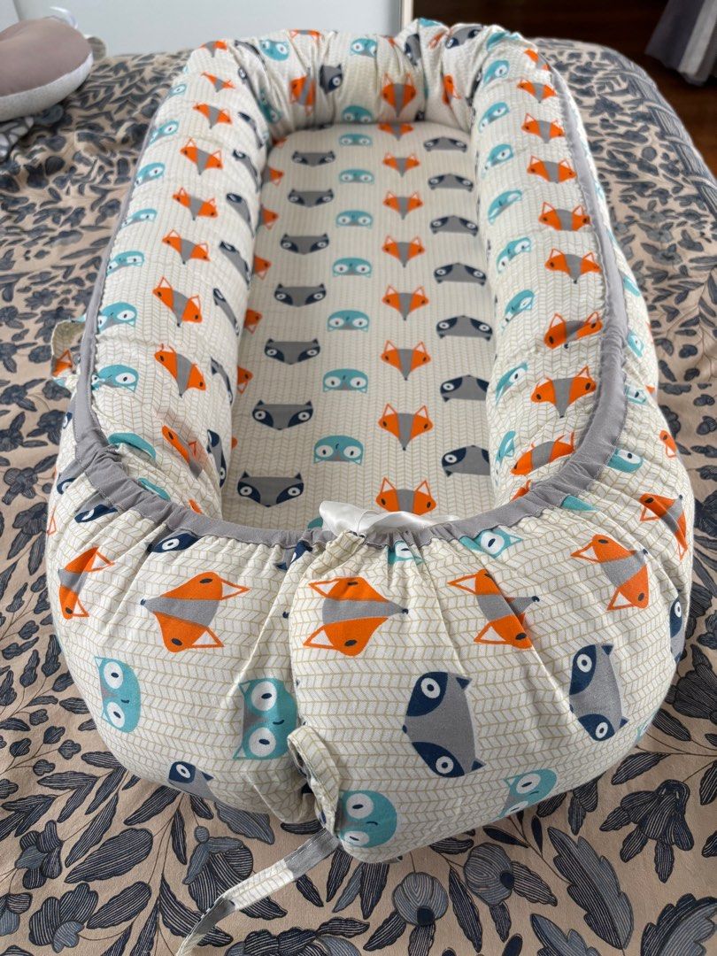 Baby Nest mobile bed (Category: Cots & Cribs) located in Singapore. Submitted by ajt883 (Listing ID 1373095373, Image 1). Description: Barely used, in great condition .