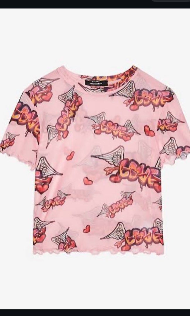 bershka y2k pink mesh top printed design (Category: Blouses) located in Pasig City. Submitted by araluvsu (Listing ID 1373210015, Image 2). Description: best fit s-m (medium on tag) never worn mop: gcash mod: same day, jnt, lbc.
