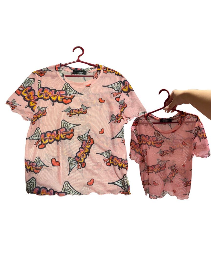 bershka y2k pink mesh top printed design (Category: Blouses) located in Pasig City. Submitted by araluvsu (Listing ID 1373210015, Image 1). Description: best fit s-m (medium on tag) never worn mop: gcash mod: same day, jnt, lbc.