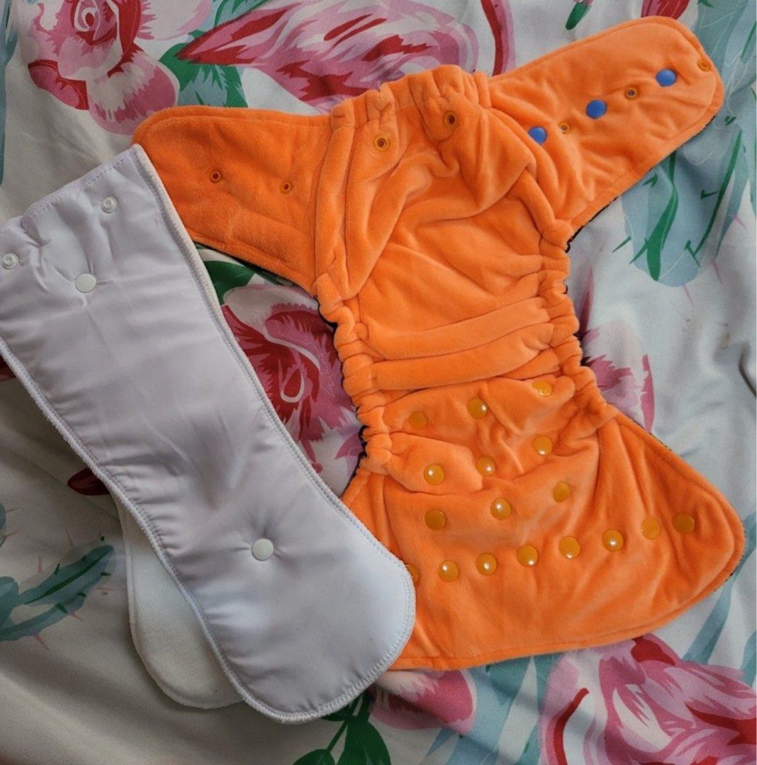 Cloth diapers / inserts and baby bag (Category: Diapers & Baby Wipes) located in Marikina City. Submitted by 1stuffshop (Listing ID 1373145838, Image 3). Description: LETTING GO.... ✅️BUTT TALKS SSCV (USED ONCE)❗️ ✅️THET’S CLOSET (MTO) -HUNTER X HUNTER WITH INSERT BRANDNEW❗️ -WITH EXTRA INSERT AND PAD (FORGET KO NA TAWAG BASTA FOR EXTRA DRY/WATERPROOF) -FEATHER VGUC (ALMOST LIKE NEW) WITH INSERT ✅️TOUCH OF LUCAS - COOLA PEACH TOP 2PCS BRANDNEW SH
