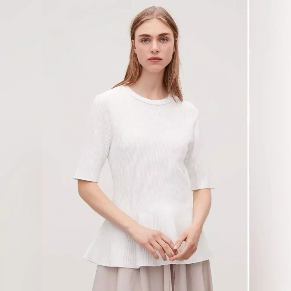 COS Ripple Stitched White Knitted Peplum Top (Category: Blouses) located in Manila. Submitted by lachinitasph_ (Listing ID 1373130265, Image 2). Description: .