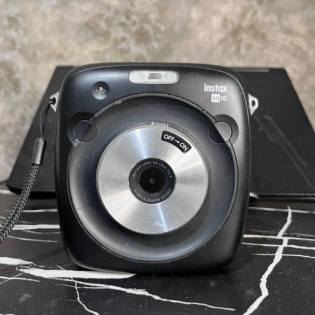 Fujifilm Instax SQ10 (Category: Cameras) located in Magalang. Submitted by engr_jp (Listing ID 1373154015, Image 2). Description: Inclusion: - unit itself - charging cable Last ang lowest price: 3K get nyo na po sagot ko na shipping Slight issue: printings automatically encountered it twice only but with proper handling hindi ko naman na ulit na experience. Also, may konting moist sa screen but it doesn’t effect the performance. If ever happen co