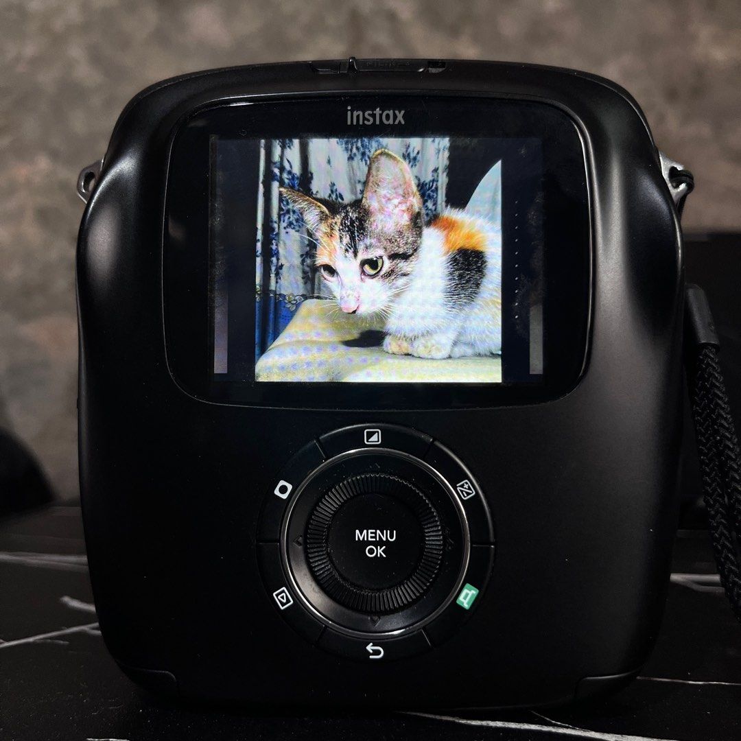 Fujifilm Instax SQ10 (Category: Cameras) located in Magalang. Submitted by engr_jp (Listing ID 1373154015, Image 3). Description: Inclusion: - unit itself - charging cable Last ang lowest price: 3K get nyo na po sagot ko na shipping Slight issue: printings automatically encountered it twice only but with proper handling hindi ko naman na ulit na experience. Also, may konting moist sa screen but it doesn’t effect the performance. If ever happen co