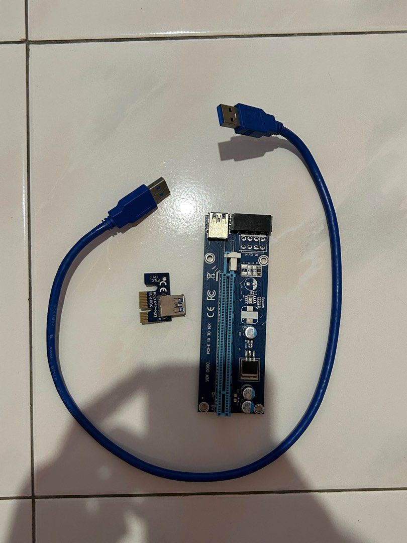 GPU Risers (Category: Computer Parts) located in Kuala Lumpur. Submitted by bryanc123 (Listing ID 1373146685, Image 3). Description: GPU Riser PCIe 3.0 x1 to x16 45cm cable Molex power port.