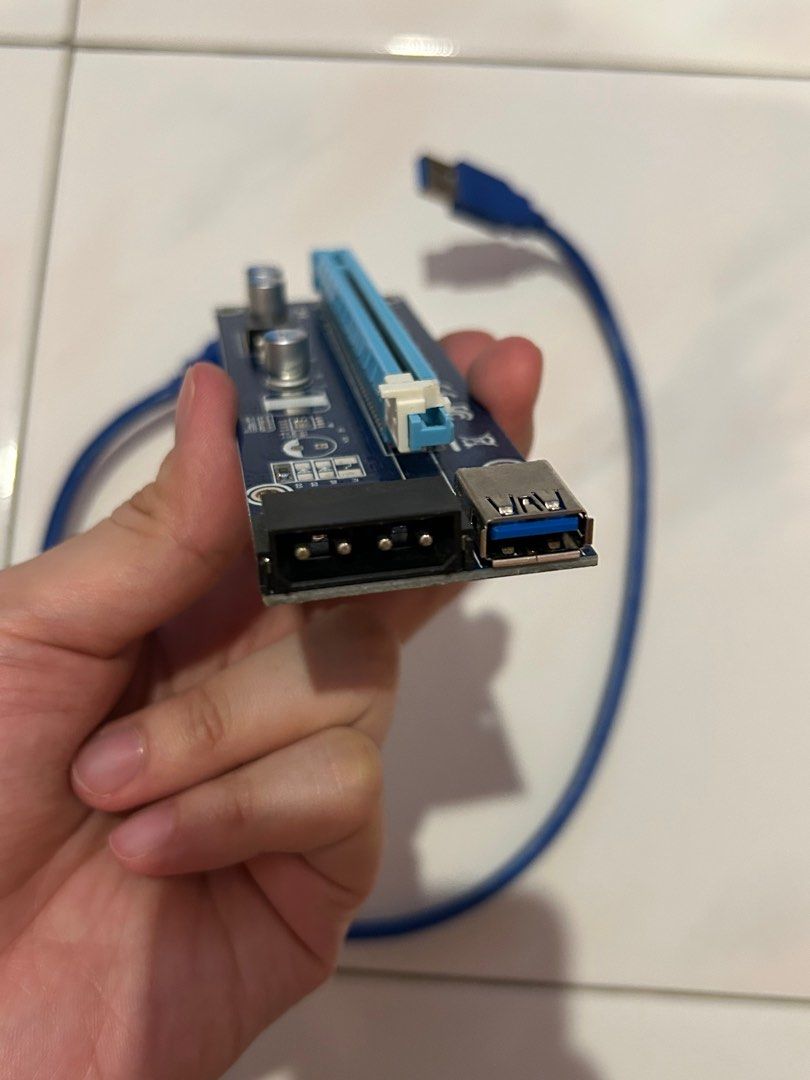 GPU Risers (Category: Computer Parts) located in Kuala Lumpur. Submitted by bryanc123 (Listing ID 1373146685, Image 2). Description: GPU Riser PCIe 3.0 x1 to x16 45cm cable Molex power port.