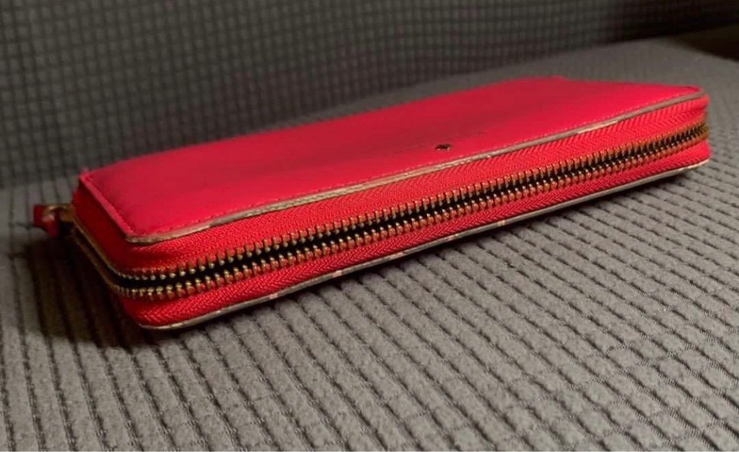 Kate Spade long wallet (Category: Wallets & Card holders) located in Manila. Submitted by sample_only (Listing ID 1373082585, Image 3). Description: Authentic with code Signs of use on the exterior buy clean on the interior Refer to photos for signs of use shipping c/o buyer.