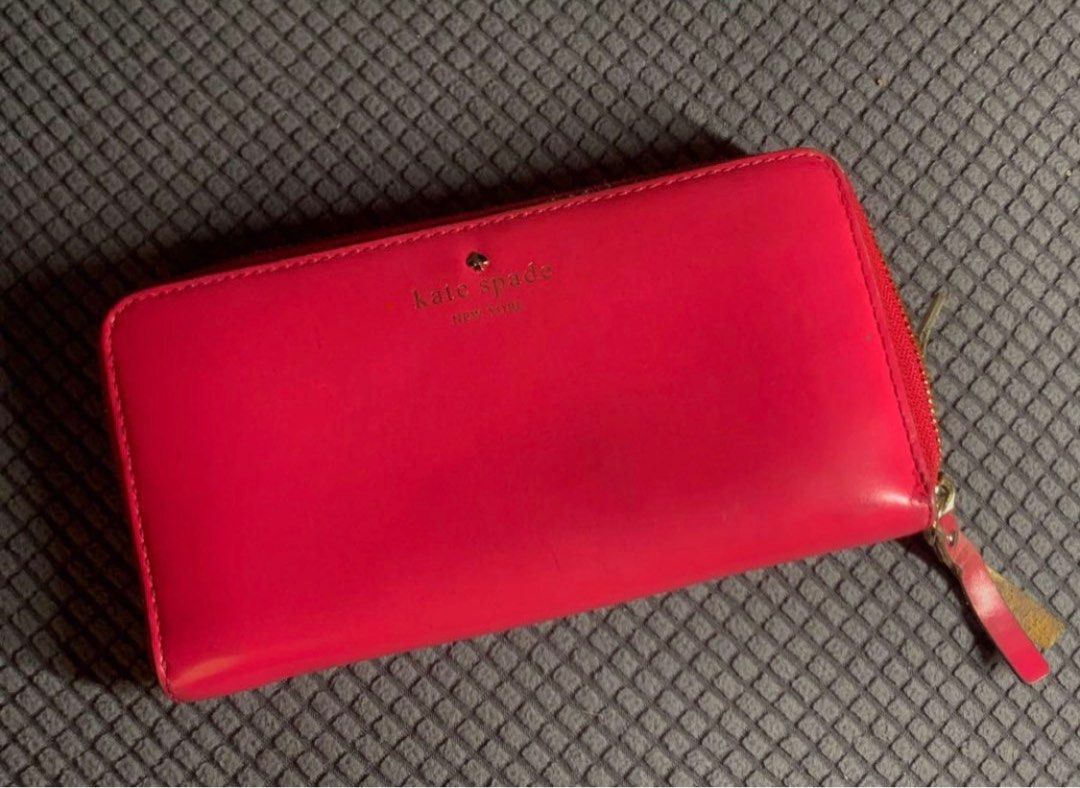 Kate Spade long wallet (Category: Wallets & Card holders) located in Manila. Submitted by sample_only (Listing ID 1373082585, Image 1). Description: Authentic with code Signs of use on the exterior buy clean on the interior Refer to photos for signs of use shipping c/o buyer.