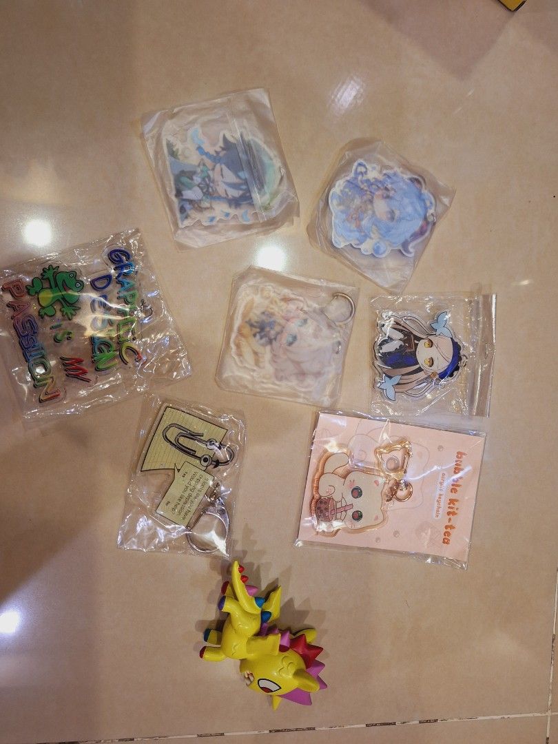 keychains! (Category: Character Goods) located in Singapore. Submitted by peppereepop (Listing ID 1373177035, Image 3). Description: brand new! each keychain is 5 dollars bubble tea cat is 7 dollars with the paperclip and frog funny keychain is $9.