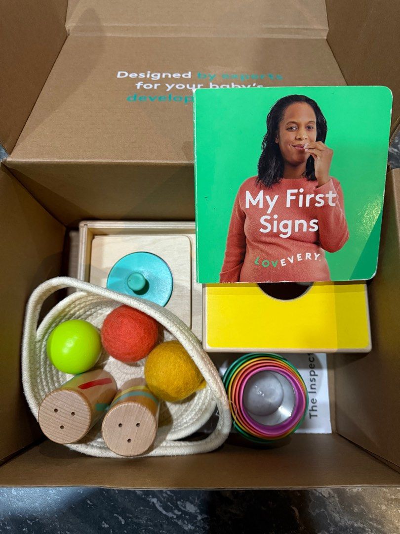 Lovevery Inspector playkit (Category: Infant Playtime) located in Singapore. Submitted by cathyx (Listing ID 1373079150, Image 1). Description: Lightly used In original box 1) First puzzle 2) Wooden sound cylinders 3) Wooden ball drop box 4) 1 wooden ball 5) 2 felt balls 6) Stacking cups 7) woven basket 8) My first sign book 9) Play guide Not included: Flash cards 1 wooden ball Price inclusive of shipping. Self collect at 410634 only Feel free to