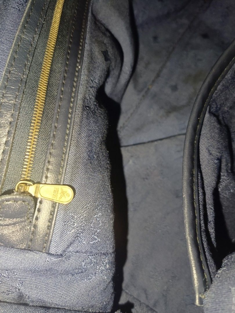 MCM Germany Boston Bag (Category: Luxury Bags & Wallets) located in San Jose del Monte. Submitted by m_nshop (Listing ID 1373175058, Image 3). Description: bawal po ito sa maselan madami na po sign of usage(rubs, not so gold na ang hardwares, may dirt na sa leather) turnable screws po sa meyal plate negotiable and willing to send pics sa serious buyer wala po long strap Japan Source 30cm po jnt courier gcash payment only.
