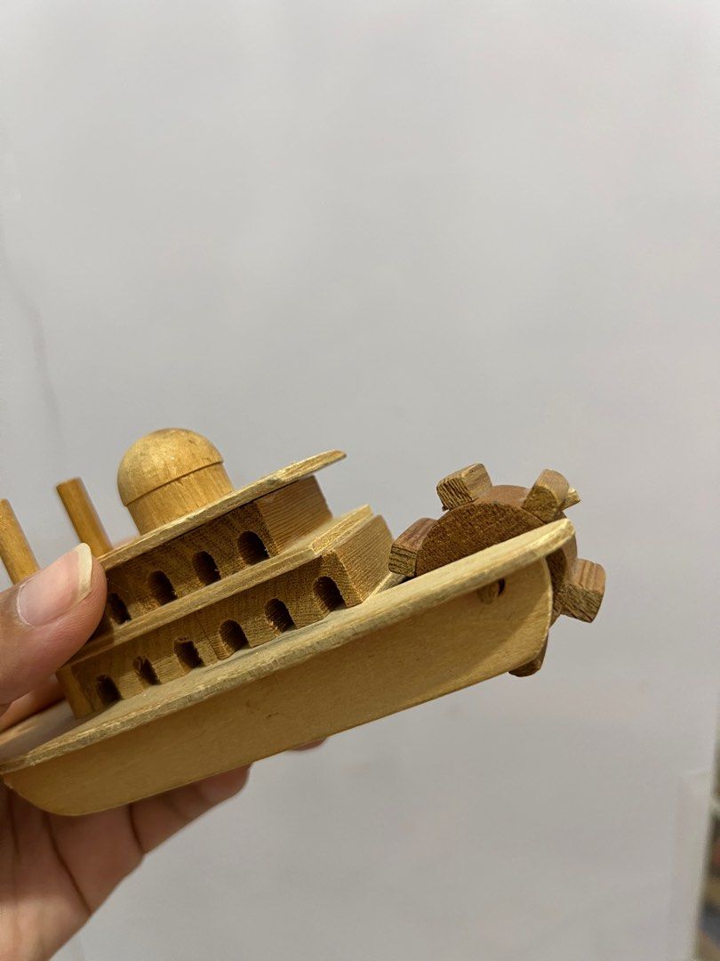 Natural Wooden ship (Category: Infant Playtime) located in Manila. Submitted by hellot_preloved (Listing ID 1373076171, Image 3). Description: Naiikot ang likod ng barko cute para sa mga makukulit na kamay. Rfs decluttering boat collection.