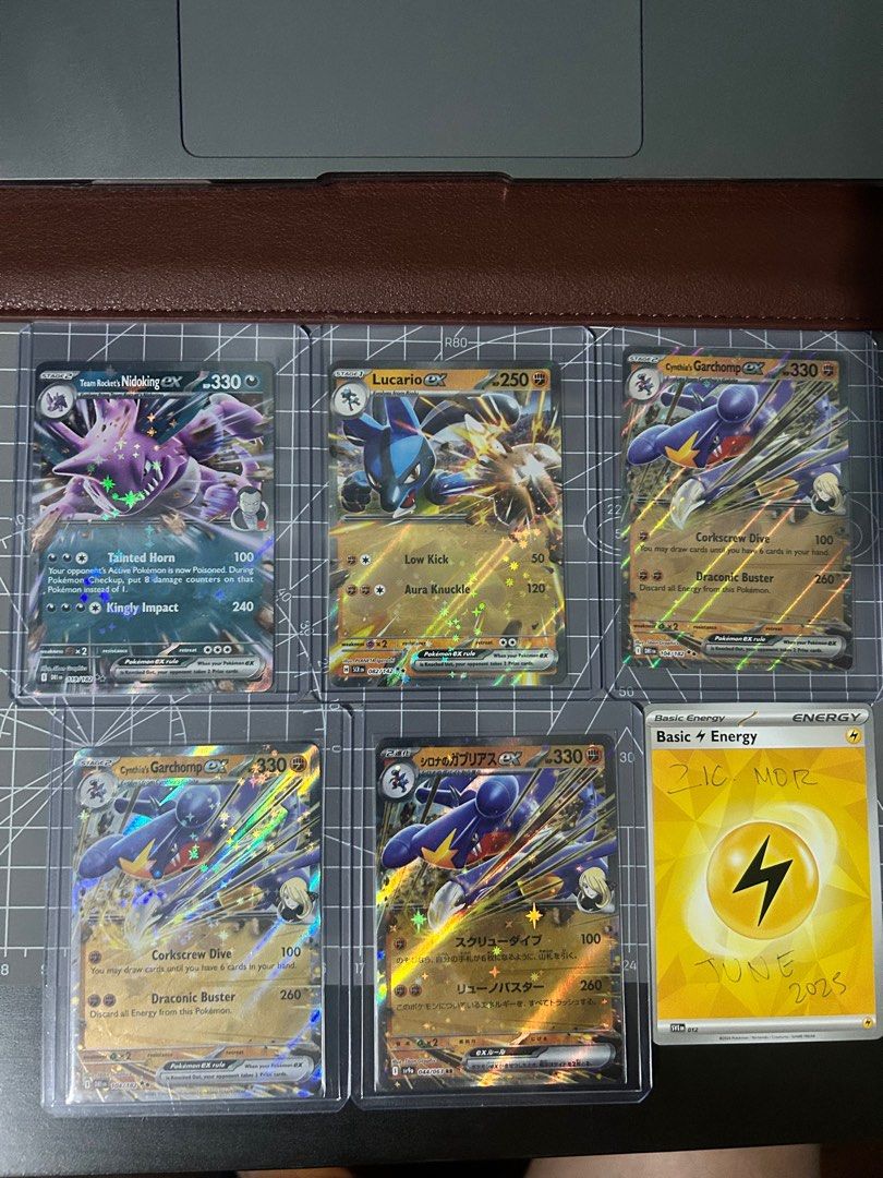 Pokemon Destined Rivals Cards (Category: Raw Singles) located in Quezon City. Submitted by dicgrayson (Listing ID 1373199063, Image 2). Description: FS: 1st pic Misty's Lapras - 2500 each Shaymin - 1700 Ethan's Ho-oh - 1300 Arven's Mabostiff - 2700 2nd pic Cynthia's Garchomp ex - 500 each Cynthia's Garchomp ex (Japanese) - 200 Team rocket's Nidoking ex - 200 Lucario ex - 200 3rd pic Rapidash - 1000 Arboliva ex - 150 Hydrapple (Japanese) 500 Regir
