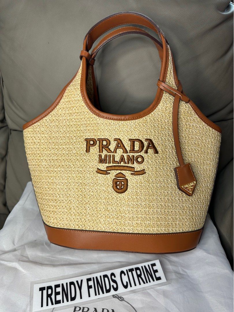 🇯🇵Prada Rafia Bag (Category: Luxury Bags & Wallets) located in Manila. Submitted by trendyfindscitrine (Listing ID 1373072401, Image 1). Description: Size 30cm Actual photo With strap .