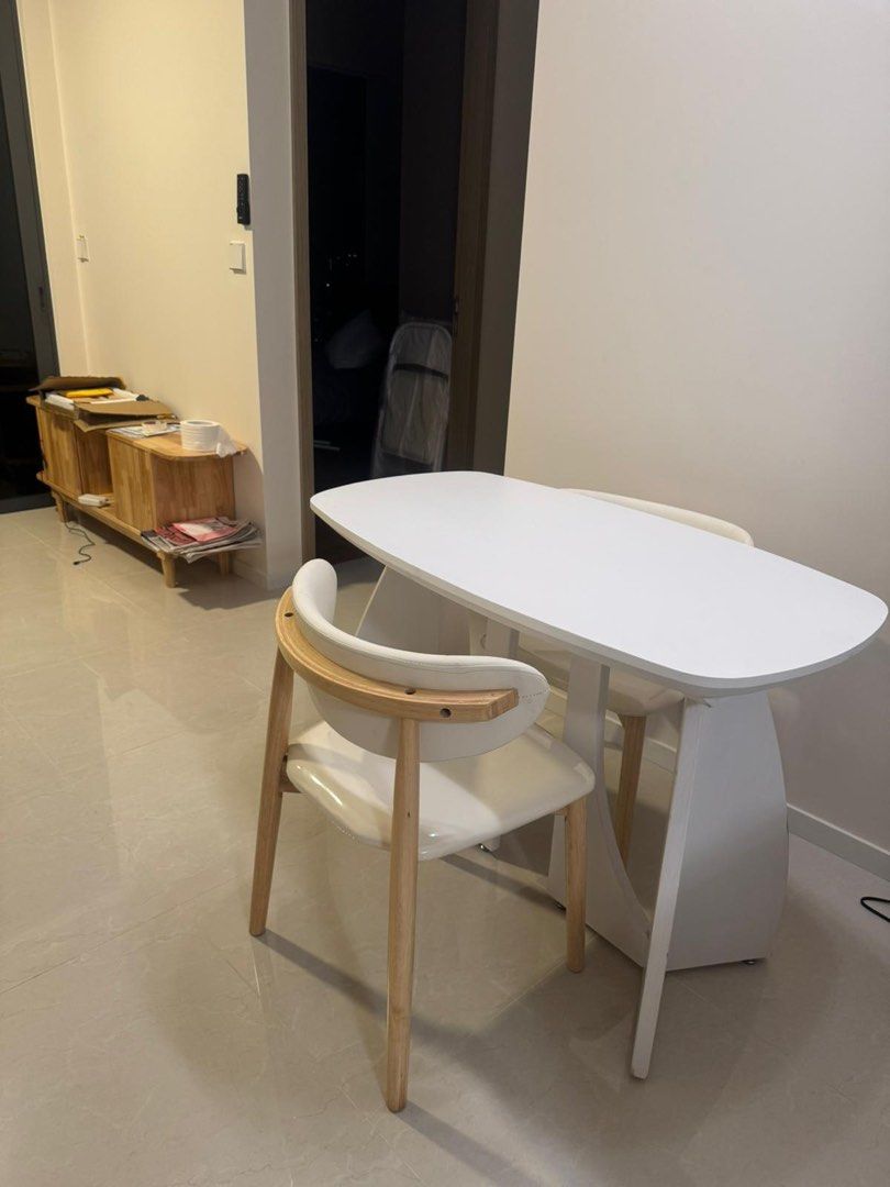 Small Dining Table (Category: Tables & Sets) located in Singapore. Submitted by fadedflorals (Listing ID 1373170233, Image 2). Description: WHITE WOOD HEAVY COS GOOD WOOD FOR 4PAX MAX 110 (Length) 60 (Width) 75 (Height).