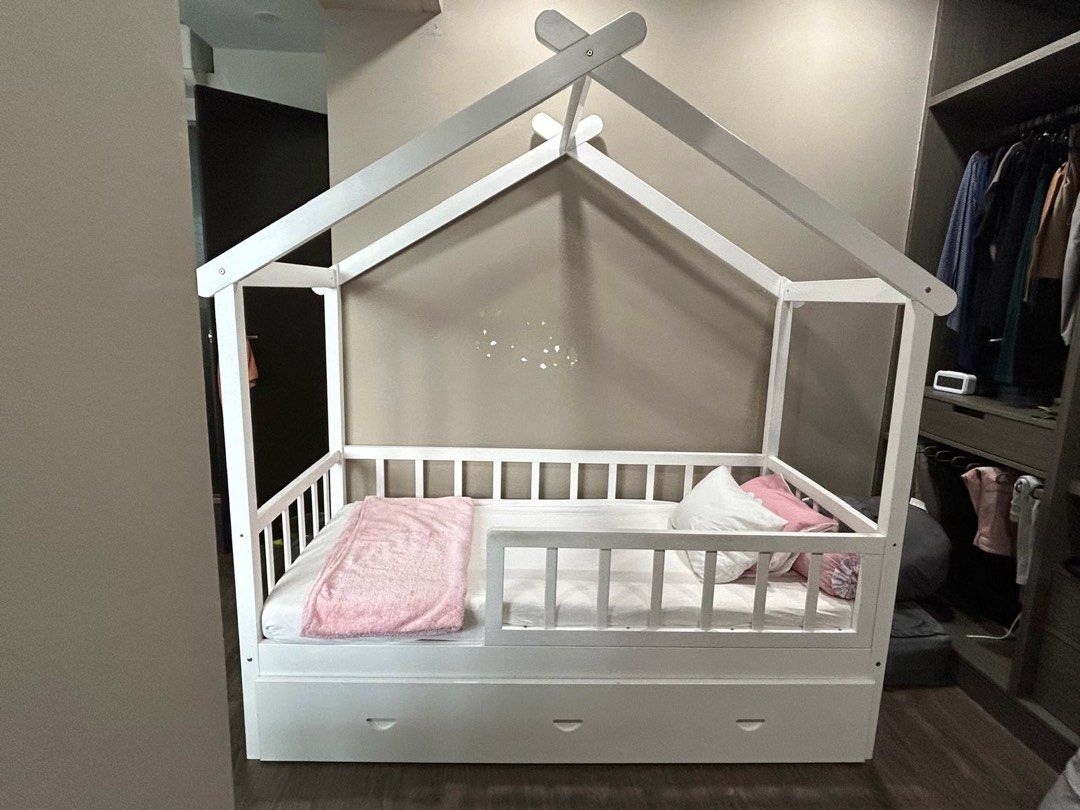 Solid wood white Children Bed House Frame + mattress + pull out (Category: Childrens' Beds) located in Singapore. Submitted by stxe23 (Listing ID 1373109167, Image 1). Description: Solid wood. Self collection at my place on June 11-14 Please dismantle yourself. Can sleep 2 kids (1 on top, 1 below) Include pull out bed with wheel Include 1 mattress (in good condition) ******** You can top up $80 for 1 ikea brand new mattress (wrap in plastic).