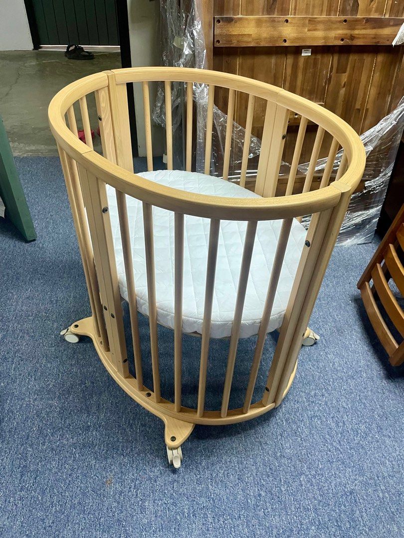 Stokke 2 in 1 mini + toddler Cot (Category: Cots & Cribs) located in Singapore. Submitted by Baby_City (Listing ID 1373077037, Image 2). Description: Genuine Stokke 100% Authentic Mini(0-6month old) + Oval (up to 4 years old) Used in well maintained condition with normal signs of usage as it’s used before and not brand new. Very clean and all good .