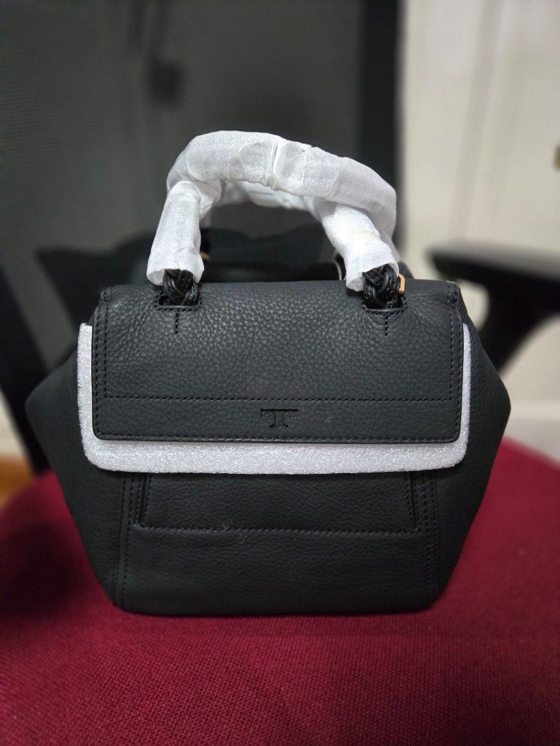 Tory Burch (Category: Luxury Bags & Wallets) located in Quezon City. Submitted by macview (Listing ID 1373126744, Image 3). Description: brand new. with Rustan tag. comes with dust bag..