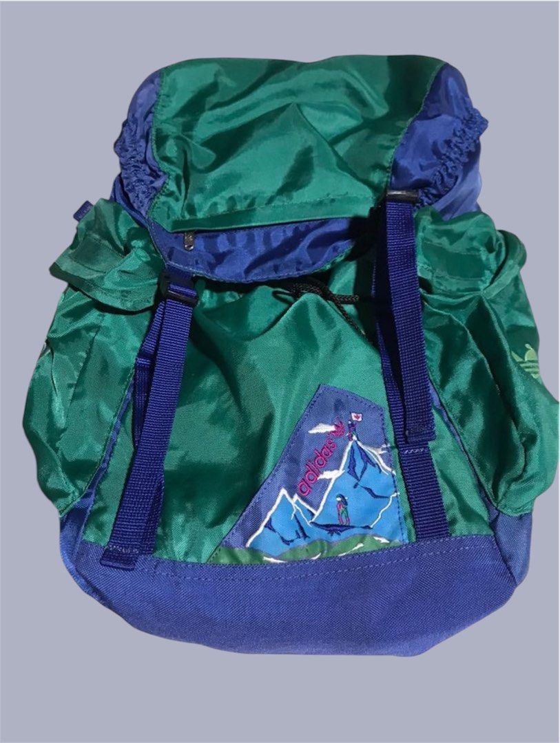 Vintage Adidas backpack. Hiking (Category: Backpacks) located in Dumaguete. Submitted by trueno99 (Listing ID 1373193294, Image 1). Description: Vintage adidas backpack Many pockets and pouches Good for camping or traveling Also has a cushion on the back to protect and cushion back Excellent condition but had a small dot/shadow on the top of Bag which is barely noticeable (also needs a wash) dumaguete location .