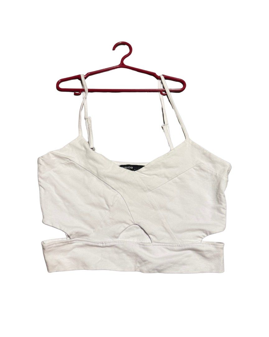 white cut out sleeveless top (Category: Sleeveless) located in Pasig City. Submitted by araluvsu (Listing ID 1373208625, Image 1). Description: inside brand on tag (thrifted) best fit s-m never worn mop: gcash mod: same day, jnt, lbc.