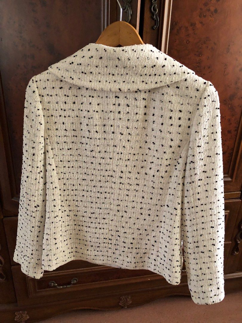 Wool jacket (Category: Coats, Jackets and Outerwear) located in Davao. Submitted by stylecircuit (Listing ID 1373113117, Image 2). Description: White with black piping & dots & sequin bits, nice buttons, fully lined, Japan made; fits medium to large (if unbuttoned).