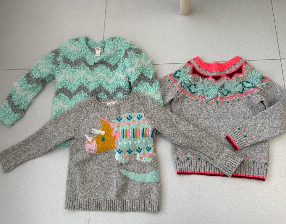 4T knitted tops (Category: Babies & Kids Fashion) located in Singapore. Submitted by underpugspell (Listing ID 1373283730, Image 1). Description: The triceratops grey can fit a 3T better. The other 2 suitable for 3-4T. The green grey being the longest somehow probably due to the material. Each piece for 15. Mail(++). .