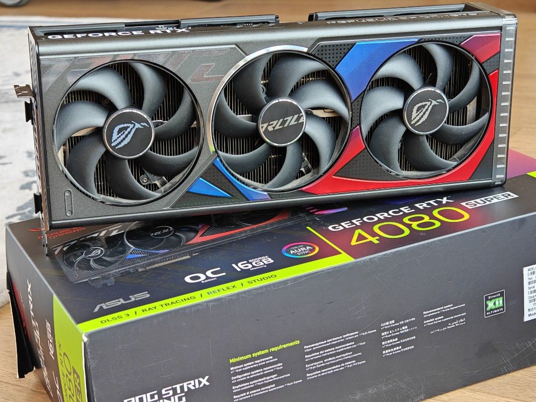 ASUS ROG STRIX RTX 4080 SUPER OC O16G GPU GRAPHICS CARD Nvidia GDDR6X (Category: Computer Parts) located in Singapore. Submitted by sg_rc (Listing ID 1373248174, Image 1). Description: Full box, full accessories, perfect condition NEVER overclocked, NEVER mined crypto. Barely used in personal gaming rig No pets, no smoking, air conditioned room, extremely clean household Very high silicon quality, 3d mark TimeSpy graphics score 29000++ out of the