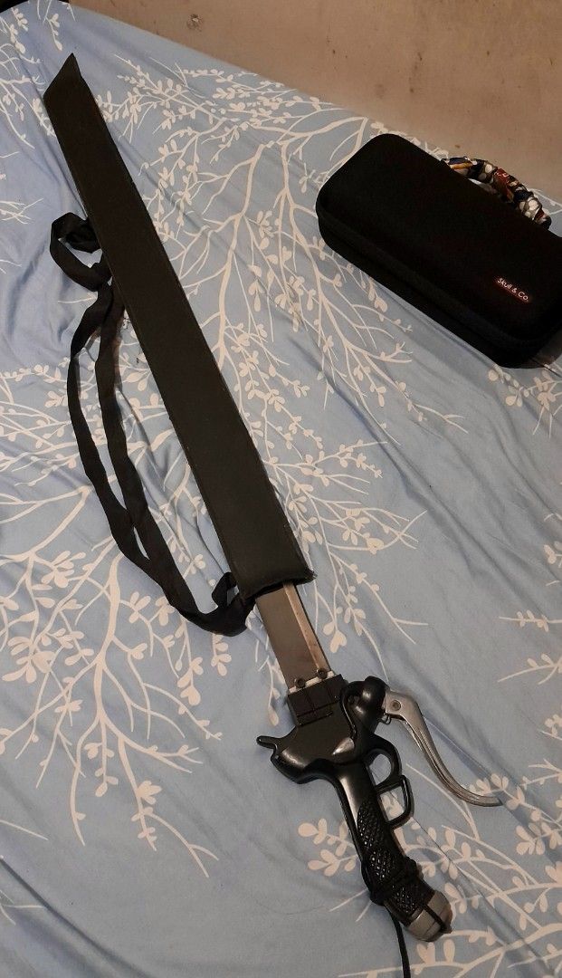 Attack on Titan (Category: Figurines & Statues) located in Pasig City. Submitted by mamon10 (Listing ID 1373297468, Image 3). Description: Approx. 43 inches. Weighs around 1.5 - 2 kgs. Has stains and a few marks but can be removed with proper care and cleaning. Scabbard is torn and tearing apart but it covers. No box available. This was a gift from a friend way back when. Slightly negotiable. Payment via Bank Transfer (BPI or GoTyme) Seller has t