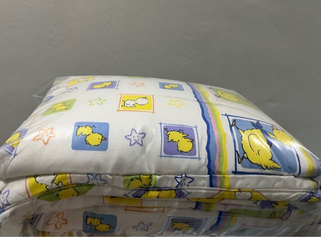 Baby Cot Bumper (Category: Cots & Cribs) located in Singapore. Submitted by aloneranger (Listing ID 1373335038, Image 2). Description: Baby Cot bumper with 2 Bolster cover and a Baby Comforter. Washed and packed in ziplock bag.