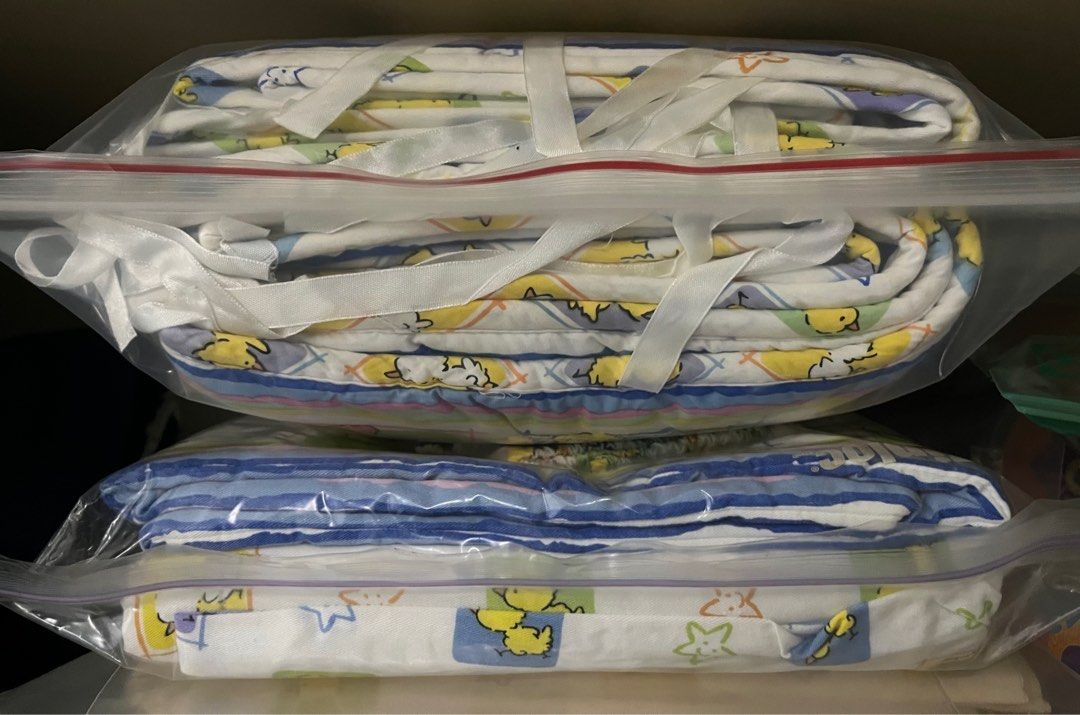 Baby Cot Bumper (Category: Cots & Cribs) located in Singapore. Submitted by aloneranger (Listing ID 1373335038, Image 1). Description: Baby Cot bumper with 2 Bolster cover and a Baby Comforter. Washed and packed in ziplock bag.