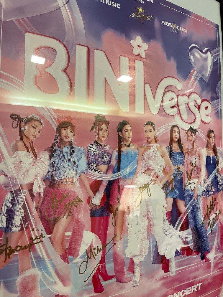 BINI Signed Poster (Category: Other Merchandise) located in Quezon City. Submitted by zukozstuff (Listing ID 1373381933, Image 2). Description: DM for price offer (im not sure how much but we can negotiate) BINIverse First Concert Signed Poster •Frame NOT included •Good Condition .