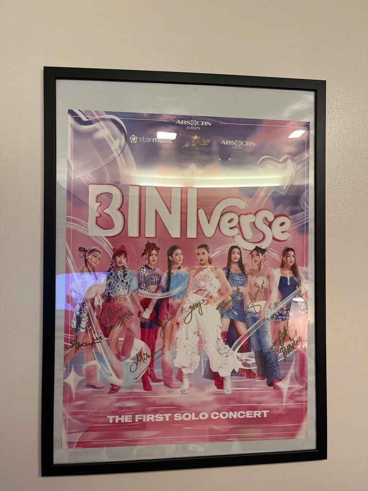BINI Signed Poster (Category: Other Merchandise) located in Quezon City. Submitted by zukozstuff (Listing ID 1373381933, Image 1). Description: DM for price offer (im not sure how much but we can negotiate) BINIverse First Concert Signed Poster •Frame NOT included •Good Condition .