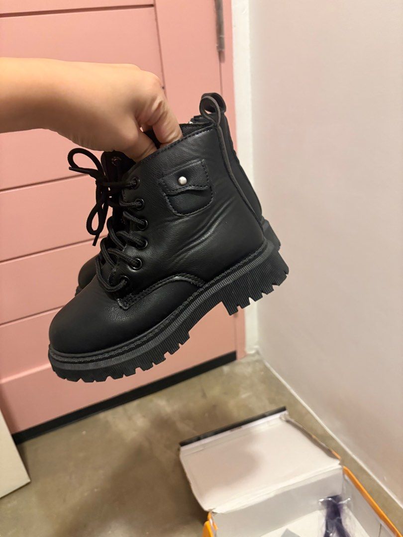 Black combat boots kids zip up 18cm (Category: Babies & Kids Fashion) located in Paranaque City. Submitted by everythinghastogo_ (Listing ID 1373251038, Image 2). Description: Used once during halloween 18cm.