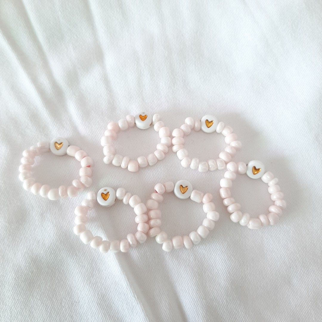 Heart Bead Rings (Category: Rings) located in Pasig City. Submitted by issa_declutter (Listing ID 1373382616, Image 2). Description: bead rings for only 10 pesos each colors available: - clear - black - white - pink IG Shop: craftsbycv.