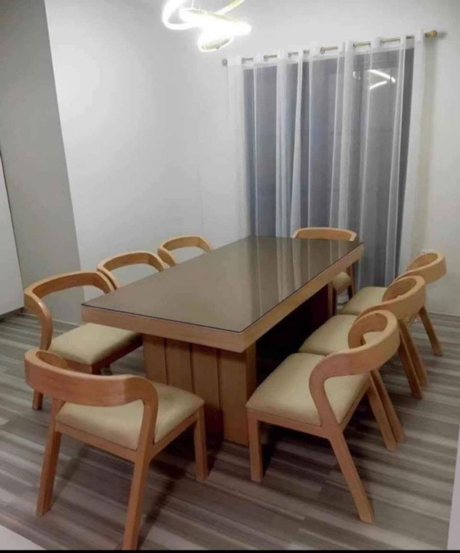 HIGH QUALITY Dining table set (Category: Tables & Sets) located in Mabalacat. Submitted by arlenemamangun01 (Listing ID 1373228541, Image 2). Description: 📣 MODERN MAHOGANY DINING SET FOR SALE 📣 ‼️ AVAILABLE ‼️ 4 Seater 6 Seater 8 Seater 10 Seater 12 Seater ✅️ Good Quality ✅️ 1 yr warranty ✅️ Made to Order ✅️ Customize Design ✅️ Top Glass ✅️ Free Shipping We also offer : 📌 BEDFRAME 📌 SALA SET 📌 TV RACK 📌 SIDE TABLE 📌 CENTER TABLE PM us for