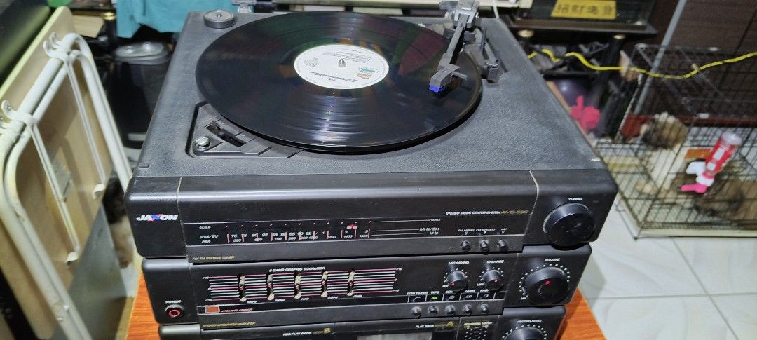 Jaxon Vinyl player + Tuner (Category: Other Audio Equipment) located in Pasay City. Submitted by marineljapansurplus (Listing ID 1373231451, Image 2). Description: Jaxon Vinyl + Cassette player AMC-690 Made in Korea Vinyl Player : Working👌 Tuner 📟: Working 👌(complete all local FM/AM station) AUX-IN: 👌 Built-in 5 band equalizer Mic input Double Cassette: change lang ng worn out belt. Price: ₱2,700 Location: Cabrera, Pasay City.