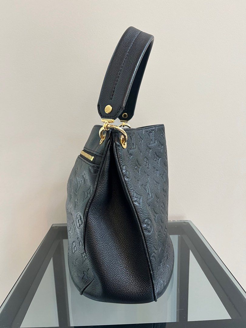 Louis Vuitton Black Monogram Empreinte Spontini (Category: Luxury Bags & Wallets) located in Quezon City. Submitted by hollaashopp (Listing ID 1373341079, Image 2). Description: Complete inclusions 9/10 condition With long strap Shoulder bag .