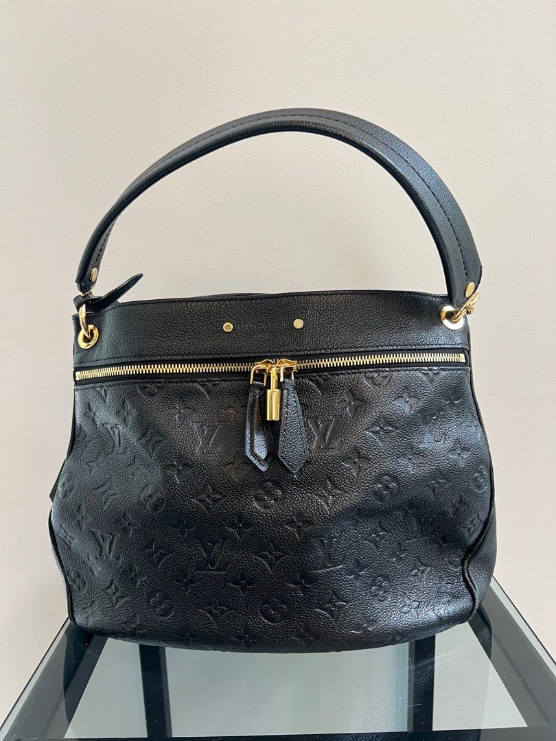 Louis Vuitton Black Monogram Empreinte Spontini (Category: Luxury Bags & Wallets) located in Quezon City. Submitted by hollaashopp (Listing ID 1373341079, Image 1). Description: Complete inclusions 9/10 condition With long strap Shoulder bag .