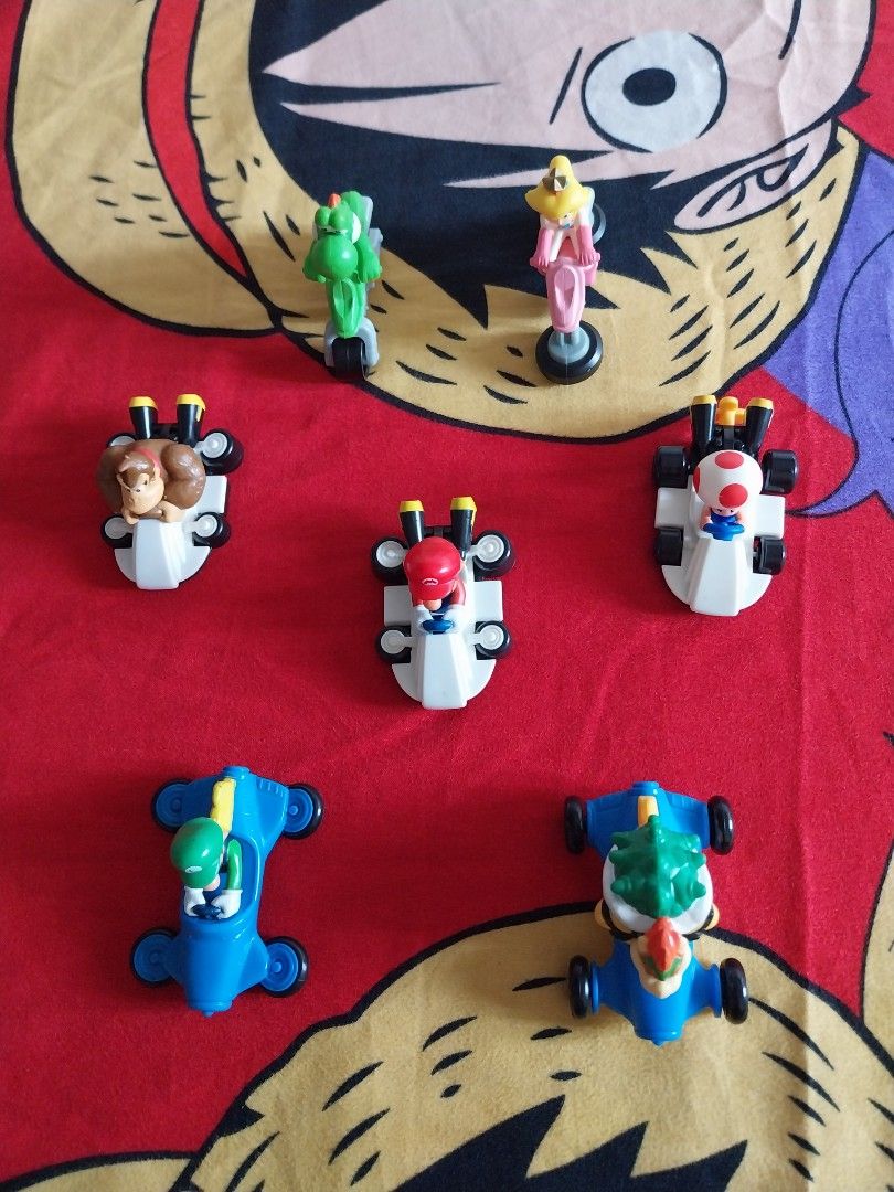 Mario Kart 2015 Mcdo Happy Meal (Category: Character Goods) located in Taguig. Submitted by fnsp27 (Listing ID 1373394195, Image 1). Description: Mario Kart 2015 Mcdo Happy Meal -Rare collectible from a decade ago! -7 Items only, No Cap all Kart! -No Stickers on the Karts!.