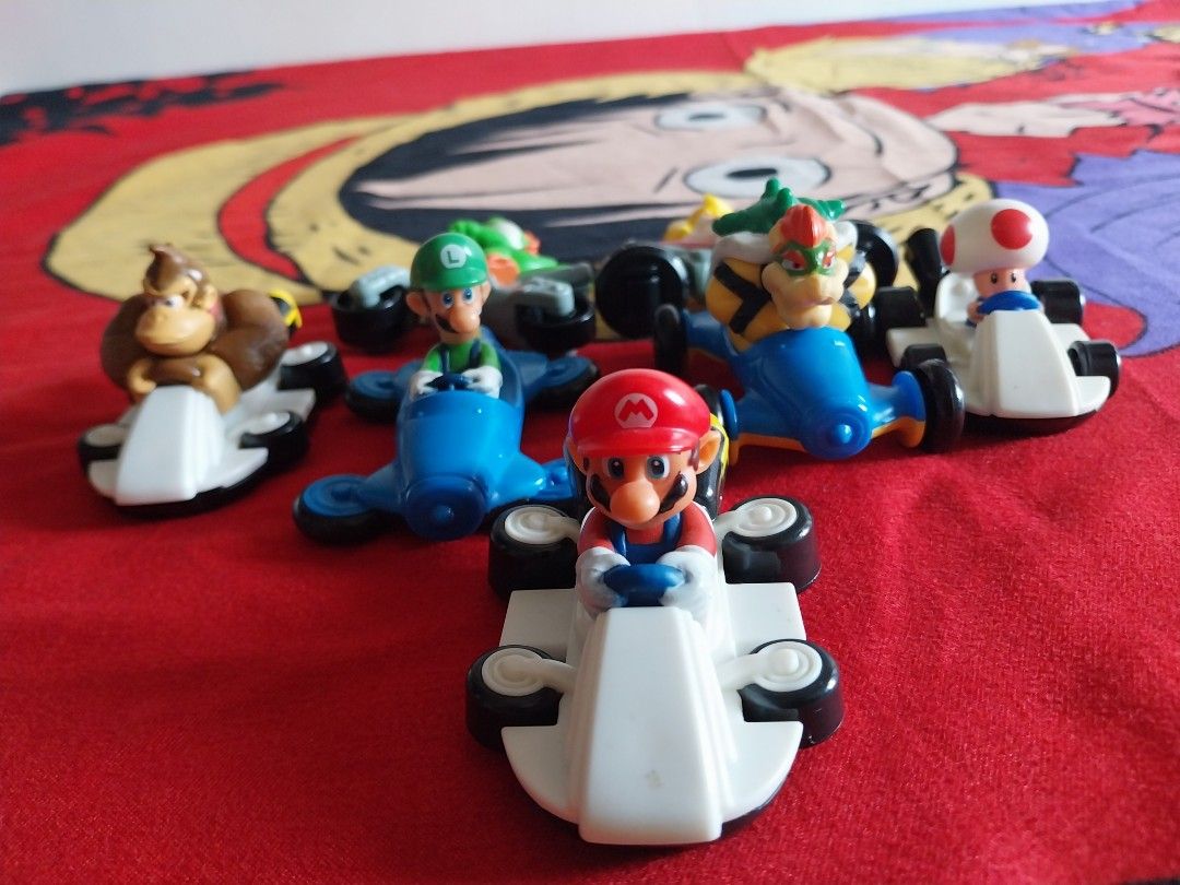 Mario Kart 2015 Mcdo Happy Meal (Category: Character Goods) located in Taguig. Submitted by fnsp27 (Listing ID 1373394195, Image 3). Description: Mario Kart 2015 Mcdo Happy Meal -Rare collectible from a decade ago! -7 Items only, No Cap all Kart! -No Stickers on the Karts!.