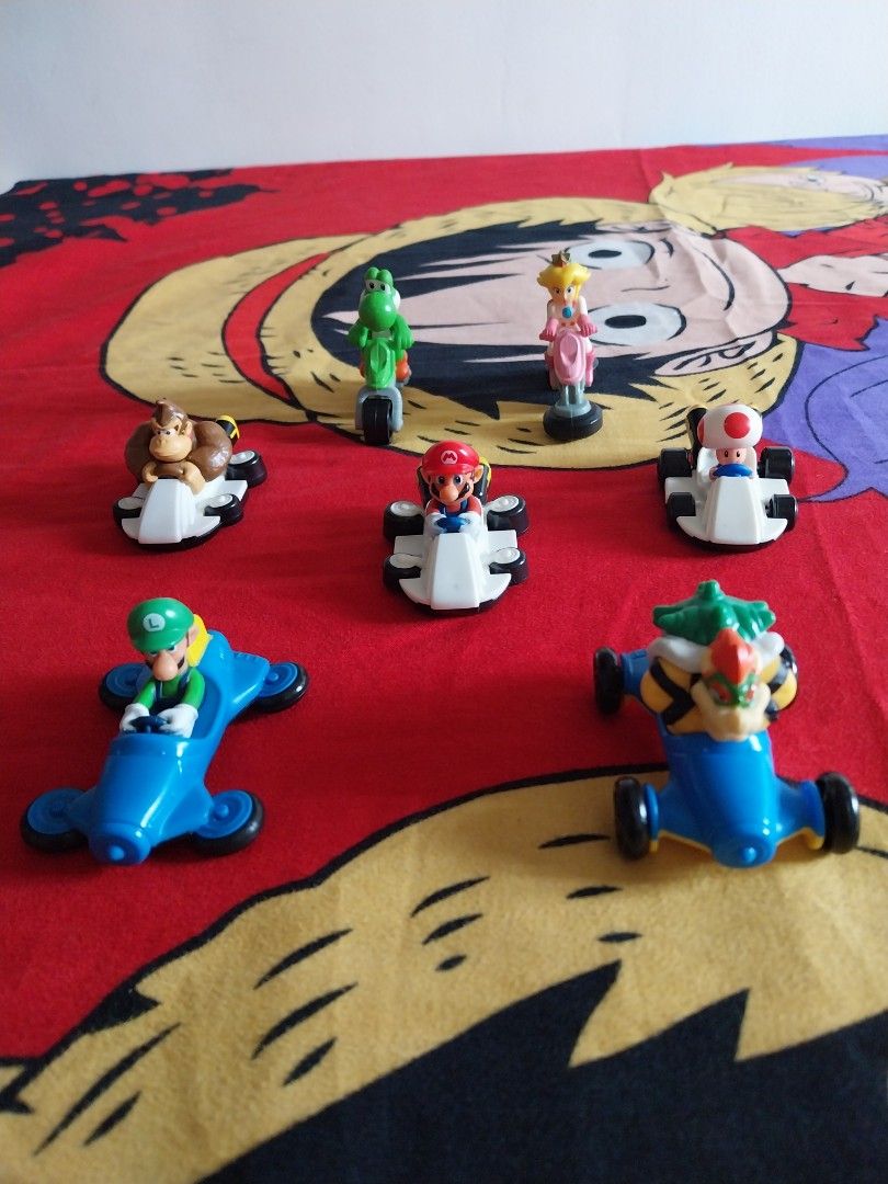 Mario Kart 2015 Mcdo Happy Meal (Category: Character Goods) located in Taguig. Submitted by fnsp27 (Listing ID 1373394195, Image 2). Description: Mario Kart 2015 Mcdo Happy Meal -Rare collectible from a decade ago! -7 Items only, No Cap all Kart! -No Stickers on the Karts!.