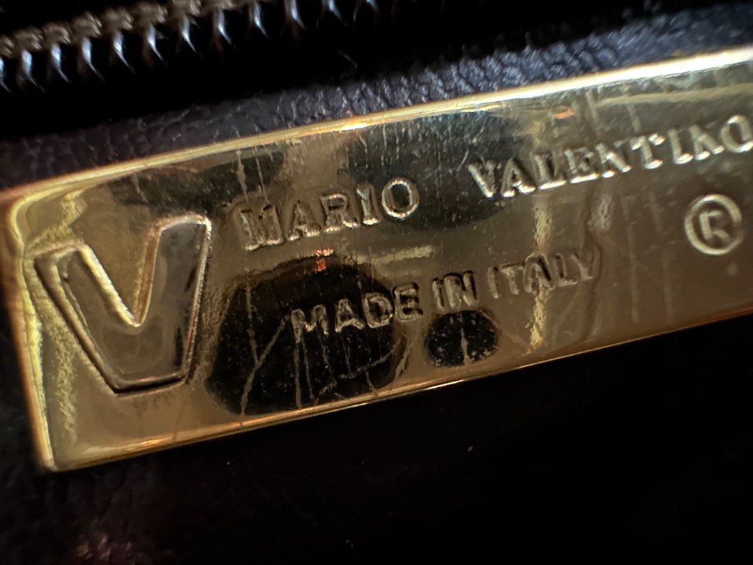 MARIO VALENTINO Clutch, Brown (Category: Clutches) located in Manila. Submitted by hey_ole1 (Listing ID 1373342304, Image 2). Description: Decluttering personal items Authentic, tarnished hardware (V) but still pretty, clean inside Bought preloved fr Japan Rfs: need more closet space Payment first thru Gcash BDO BPI Shipping fee c/o buyer thru LMove Prefers Metro Manila buyers 📍Marikina City.