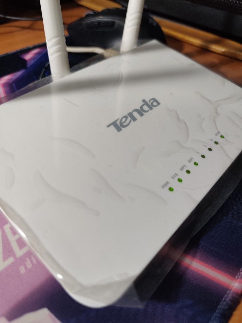 Tenda N300 Easy Wifi wireless router (Category: Networking) located in Makati City. Submitted by kittabs (Listing ID 1373250944, Image 2). Description: For sale Tenda N300 Easy Wifi wireless router like new router, pwede sa maselan! Fix Fix Fix.