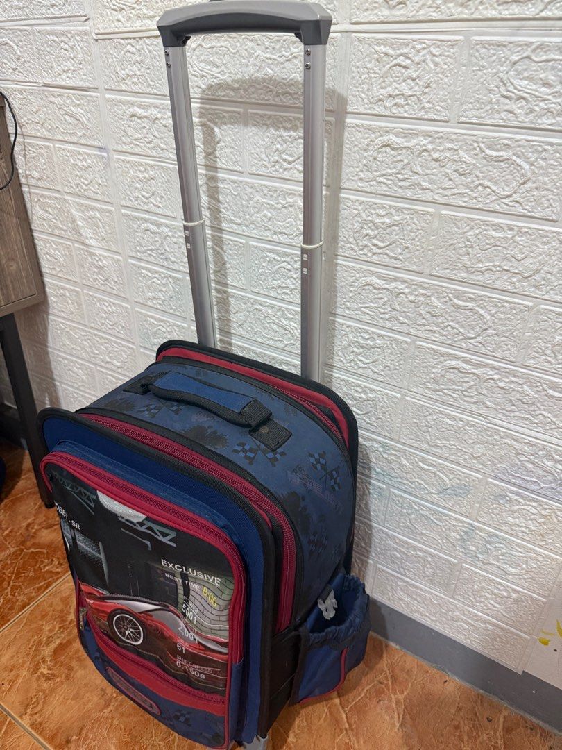Trolley School Bag for Kids (Robby Rabbit) (Category: Babies & Kids Fashion) located in Bulacan. Submitted by khey (Listing ID 1373260988, Image 3). Description: Robby Rabbit Trolley Bag for Kids No Issue (except for raincover needs stitching) For pick up only near SNR Commonwealth .