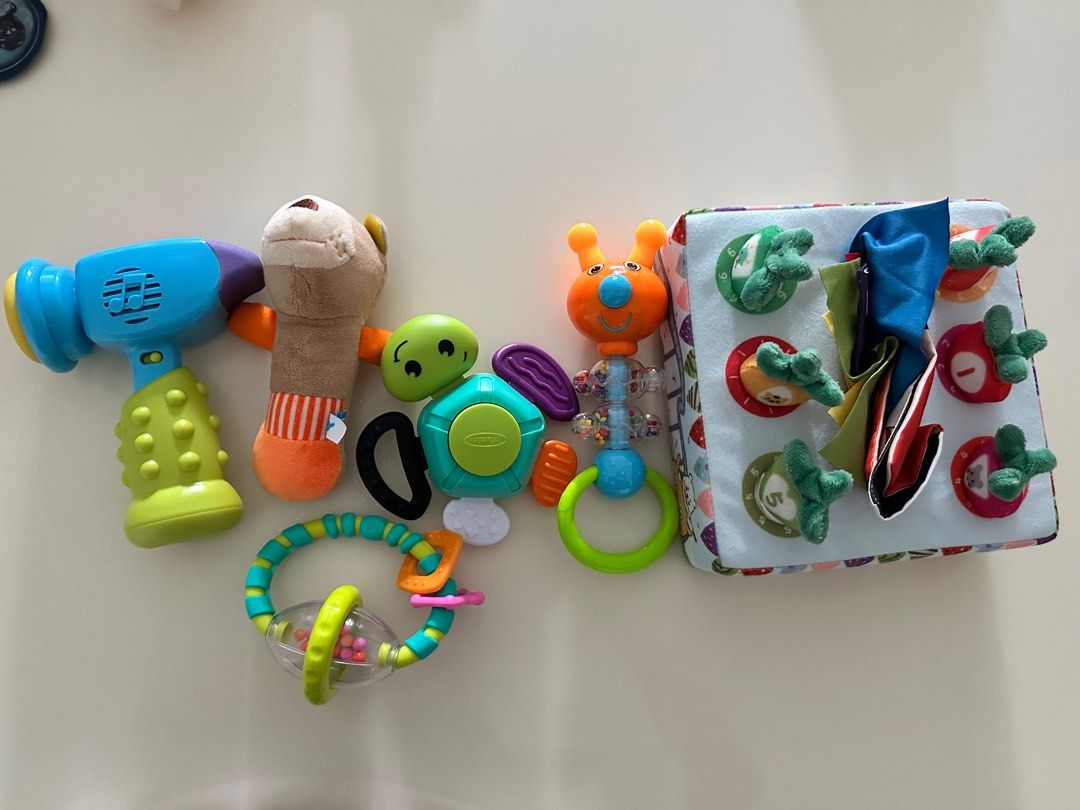 Various Baby Toys (Category: Infant Playtime) located in Singapore. Submitted by serenitymummy (Listing ID 1373288779, Image 1). Description: Take all for $18. All bought brand new and still in very good working condition as baby has too many toys to play. .