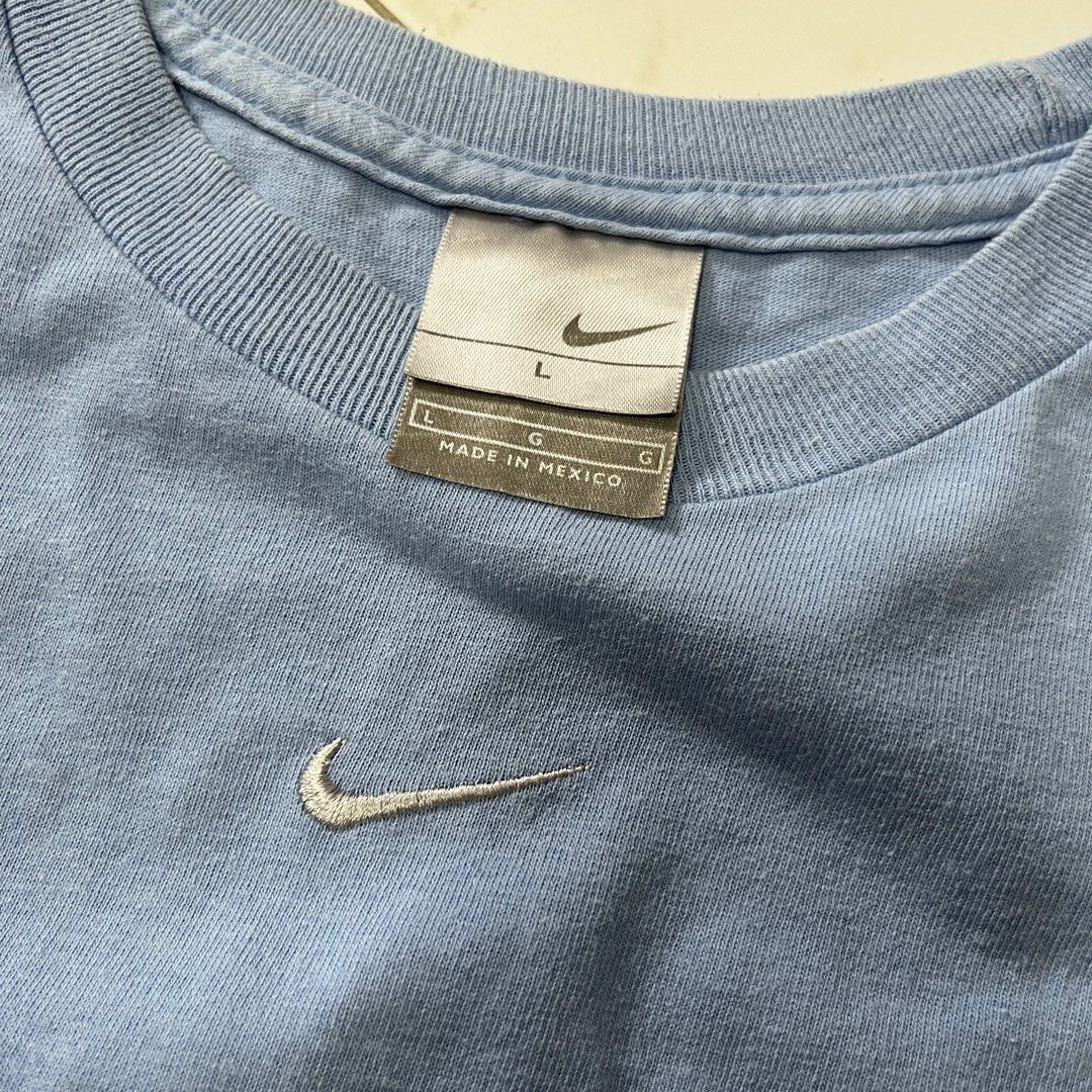 00s Vintage Nike Center Swoosh long sleeve tee (Category: Tshirts & Polo Shirts) located in Singapore. Submitted by comfyclub (Listing ID 1373491267, Image 2). Description: • size tagged L, measurements 21x28.3” • no tears or pinholes • embroidered Nike swoosh, rare light/powder blue colourway • used to be a personal piece but eventually outgrew the color and vintage tees 🤕 📦 FREE MAILING with tracking number 🧍 meetups only at my convi / extra