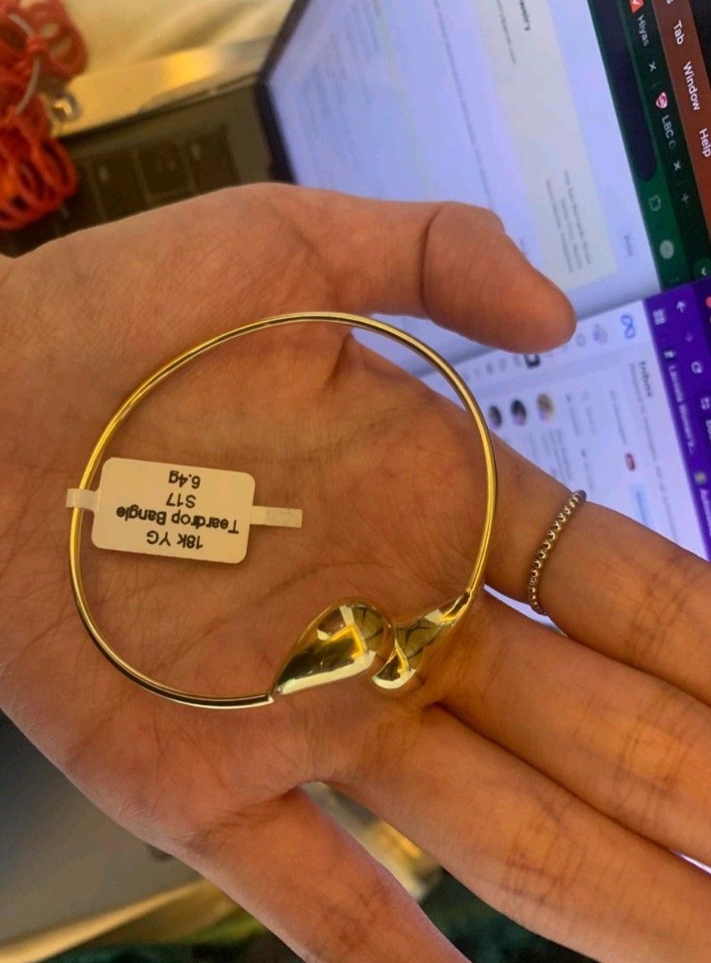 18k YG Teardrop Bangle size 19cm 6.4 grams (Category: Bracelets) located in Tuguegarao City. Submitted by mtawlph (Listing ID 1373440503, Image 1). Description: Bought but never been used. RFS: not my size.