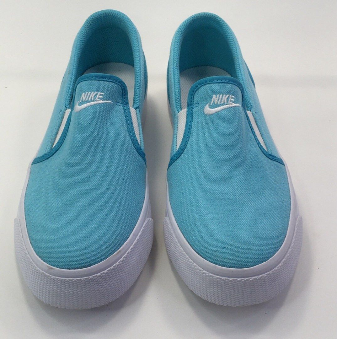 Aqua blue slip on shoes Nike (Category: Sneakers) located in Manila. Submitted by corryyy (Listing ID 1373526085, Image 1). Description: 24CM Good as nee.