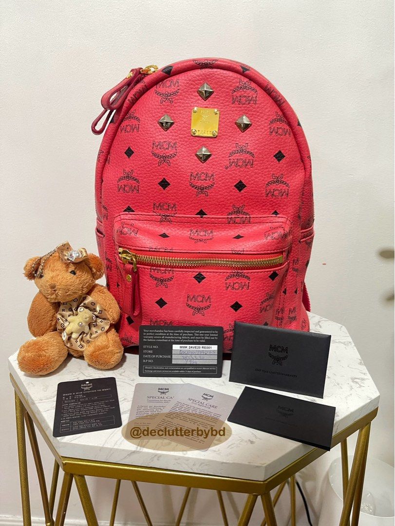Authentic 💯 MCM Stark Pink Backpack Bag (with stud) (Category: Luxury Bags & Wallets) located in Quezon City. Submitted by declutterbybd (Listing ID 1373516434, Image 1). Description: 100% Authenticity Guaranteed! (Like New) Pre-loved. Used it twice only! On Hand! Bought directly in Korea. Money Back if proven fake (Big price markdown , really need to declutter) Item Details: *Model: MCM Stark Studded Backpack Bag *Color: Pinkish red *Size: Medi