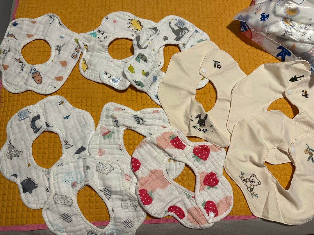 Brand new Baby cotton bib (Category: Babies & Kids Fashion) located in Singapore. Submitted by woonie_closet (Listing ID 1373552870, Image 1). Description: Brand new, Einmilk brand - $3 each Awibubu - $5each .